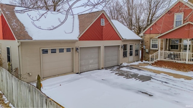 view of snow covered garage