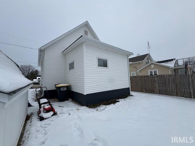 view of snow covered property