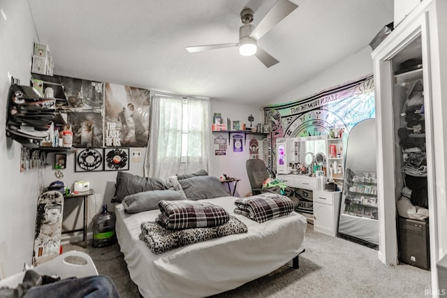 bedroom with ceiling fan and light colored carpet