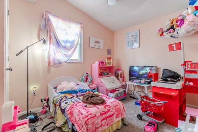 carpeted bedroom featuring vaulted ceiling