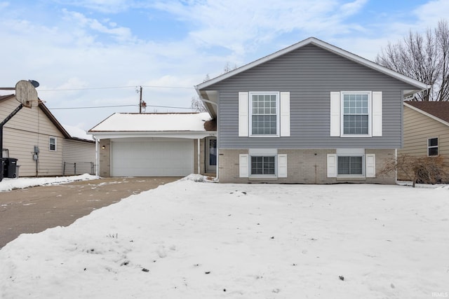 split level home with a garage