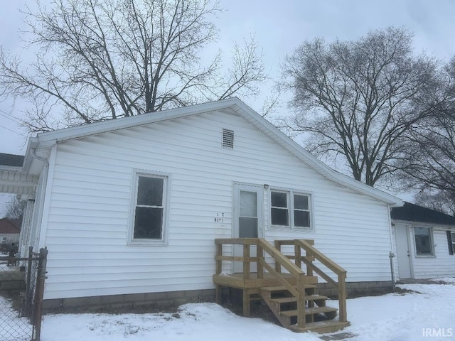 view of snow covered property