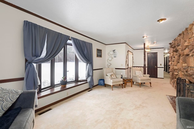 carpeted living room featuring a textured ceiling