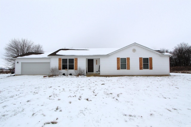 ranch-style home with a garage