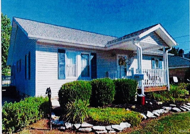 bungalow-style home featuring covered porch