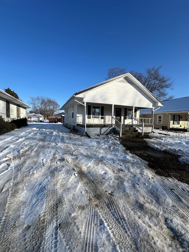 view of front of property featuring covered porch