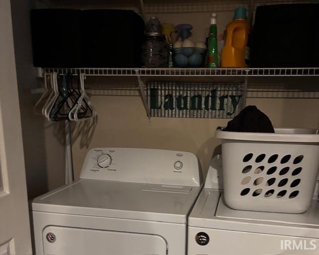 washroom with washer and clothes dryer