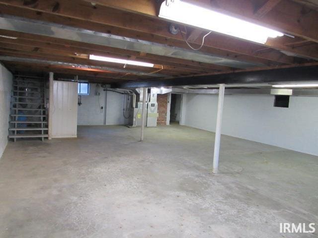 basement featuring heating unit