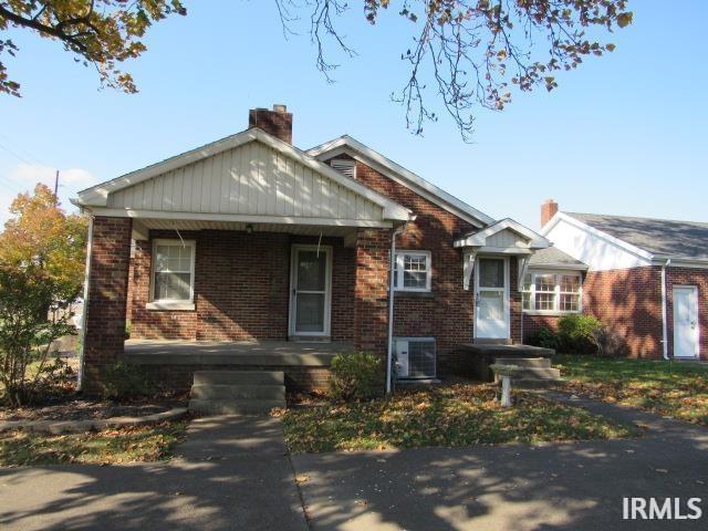 view of front of property featuring central AC unit