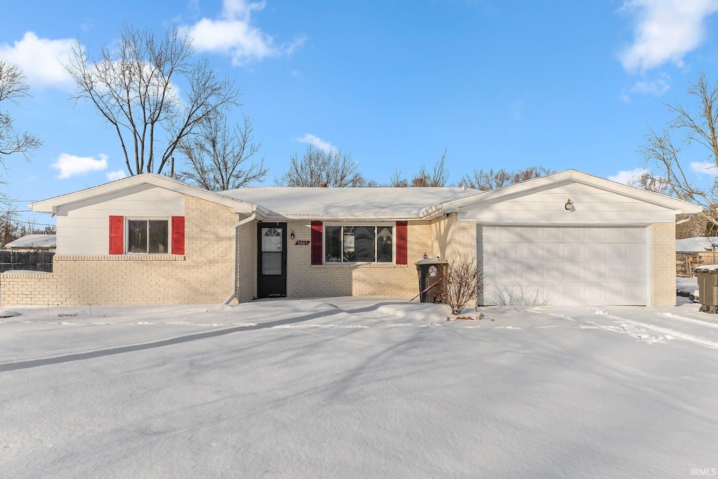 single story home with a garage