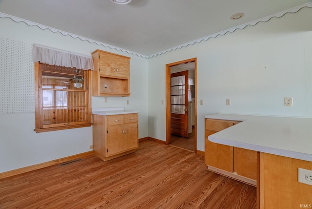 kitchen with light hardwood / wood-style flooring