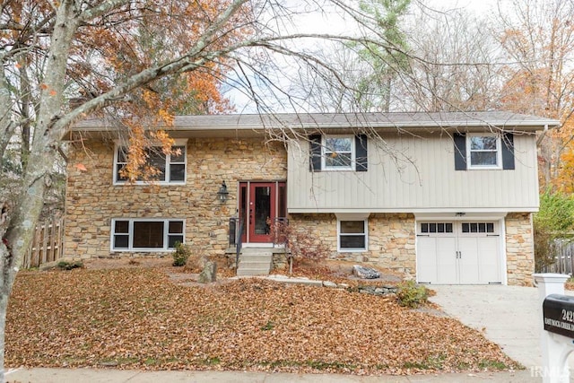 bi-level home featuring a garage