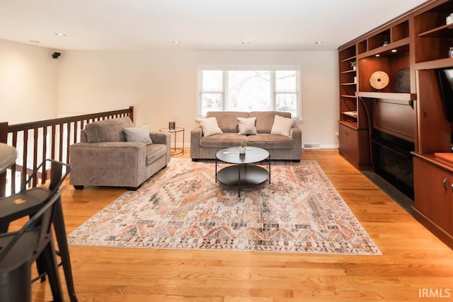 living room with hardwood / wood-style flooring