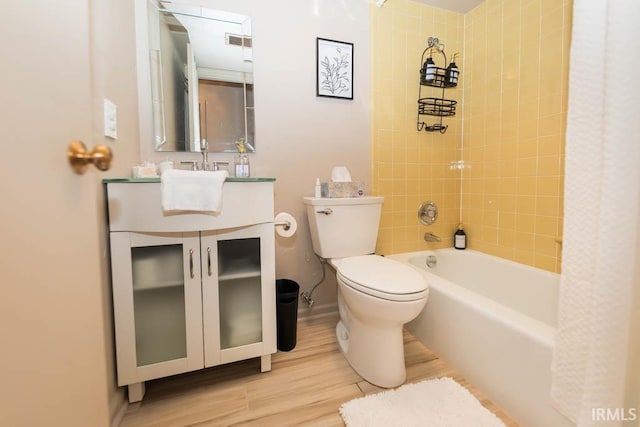 full bathroom featuring toilet, shower / bath combo, wood-type flooring, and vanity