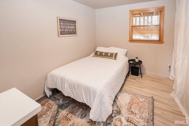 bedroom featuring light hardwood / wood-style floors