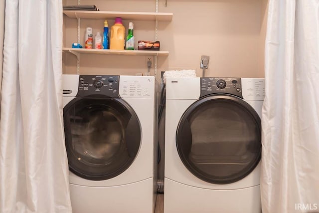 laundry area featuring independent washer and dryer