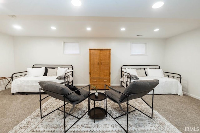 bedroom featuring light colored carpet