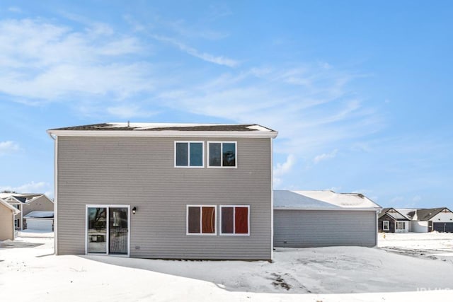 view of snow covered property