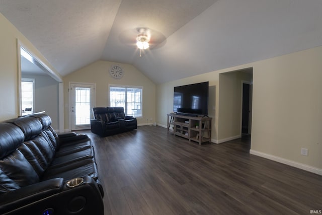 living room featuring ceiling fan, lofted ceiling, and dark hardwood / wood-style floors