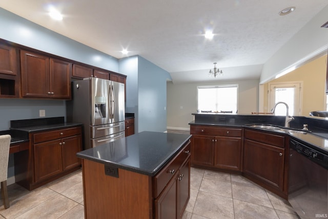 kitchen with sink, an inviting chandelier, stainless steel appliances, a center island, and light tile patterned flooring