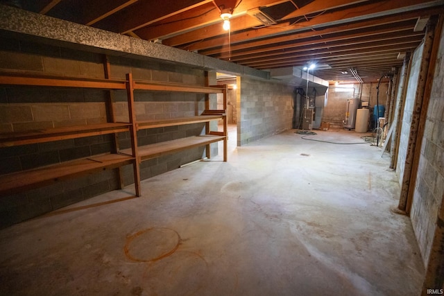 basement with heating unit and water heater