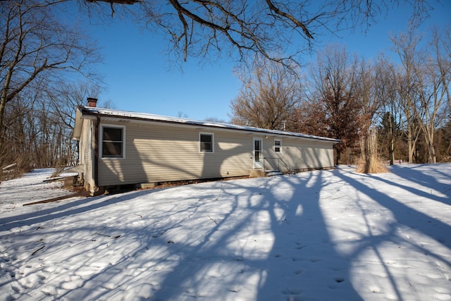 view of snow covered property