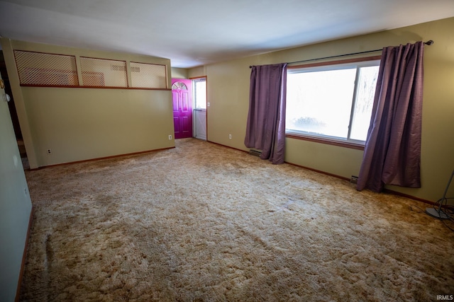 unfurnished bedroom with light carpet