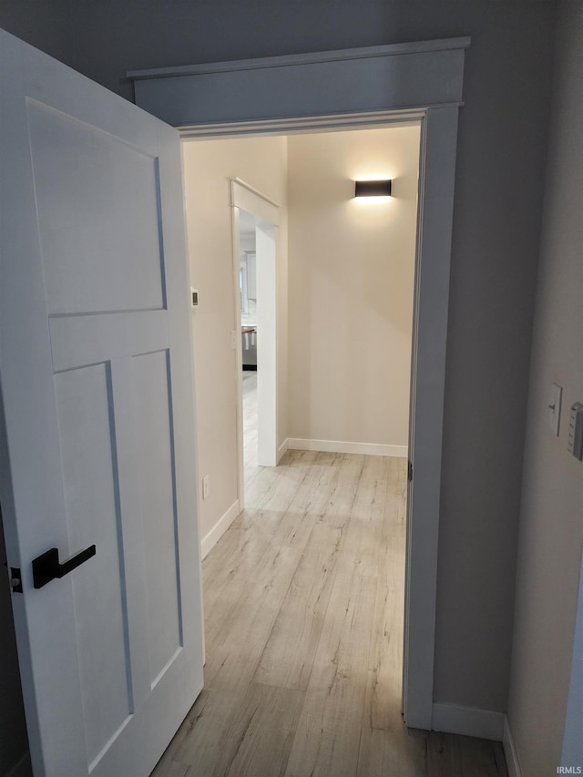 hallway featuring light wood-type flooring