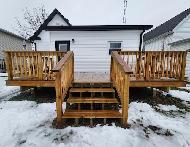 view of snow covered deck