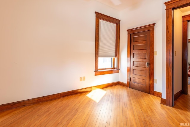 unfurnished room featuring light wood-type flooring