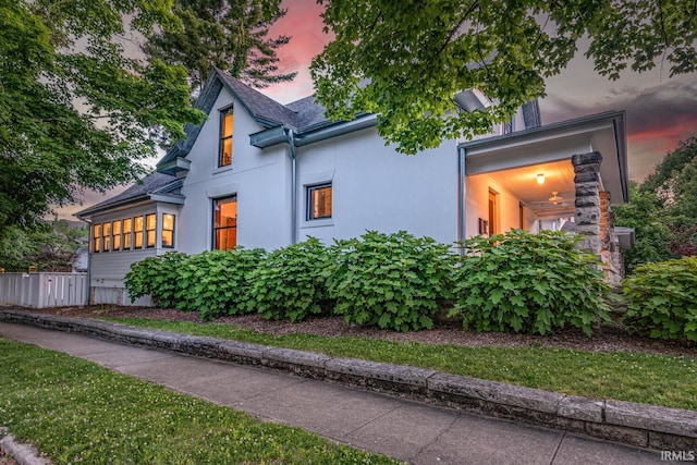 view of property exterior at dusk