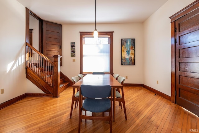 dining space featuring light hardwood / wood-style floors