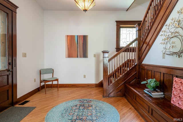 foyer entrance with light hardwood / wood-style flooring