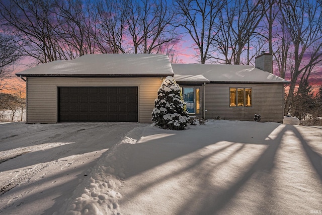 single story home with a garage