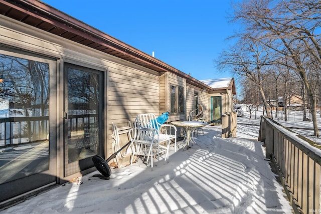 view of snow covered deck