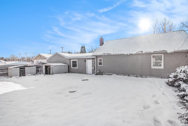 view of snow covered property