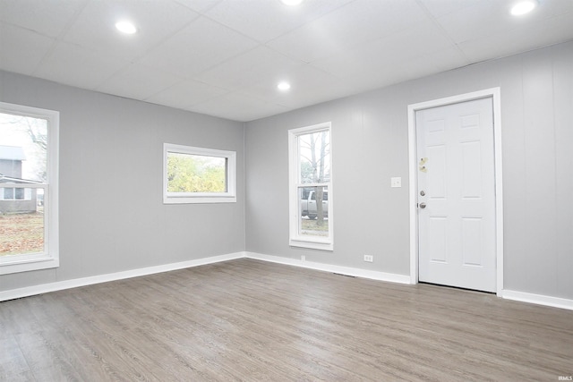 unfurnished room featuring wood-type flooring