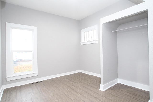 interior space featuring a closet and hardwood / wood-style floors