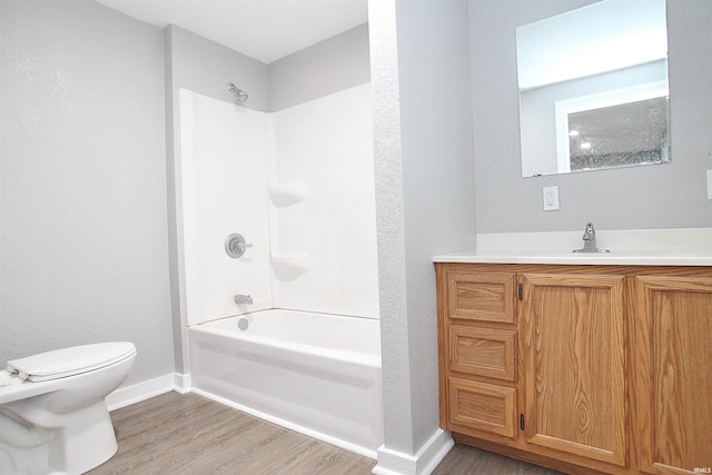 full bathroom with toilet, vanity, wood-type flooring, and shower / bathing tub combination