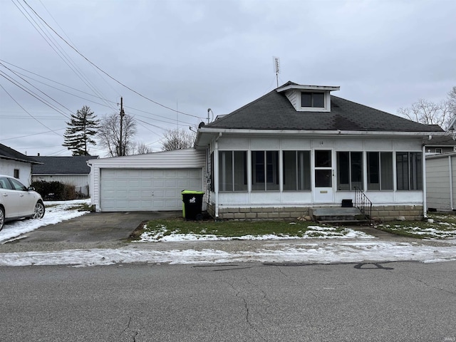 view of front of property with a garage