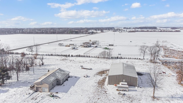 snowy aerial view with a rural view