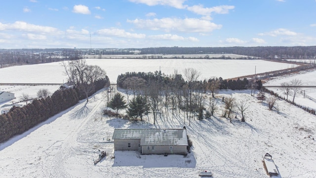 snowy aerial view with a rural view