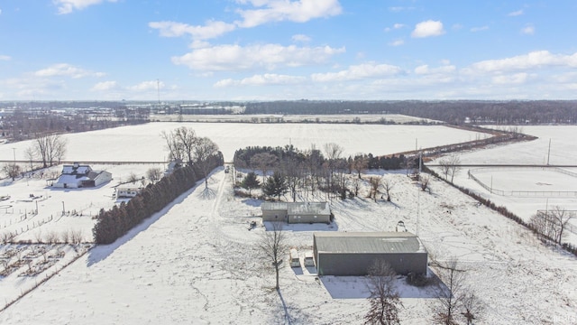 snowy aerial view with a rural view