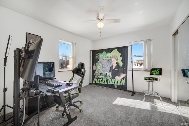 carpeted office with ceiling fan