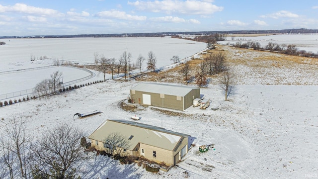 snowy aerial view with a rural view