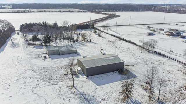 snowy aerial view with a rural view