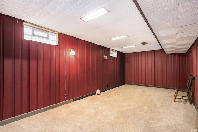 basement with light colored carpet