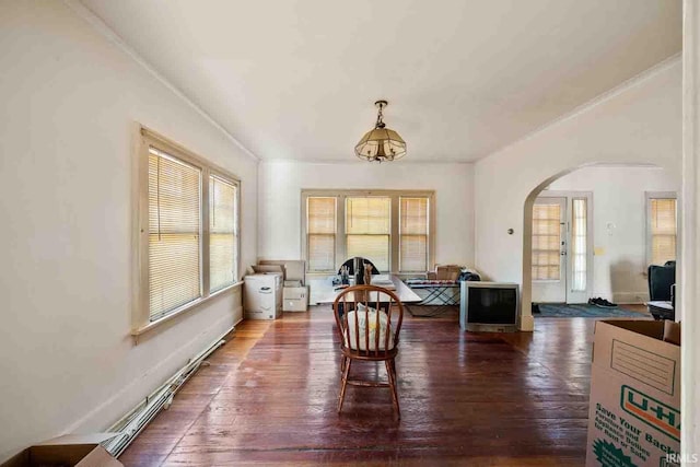 dining space with dark wood-type flooring