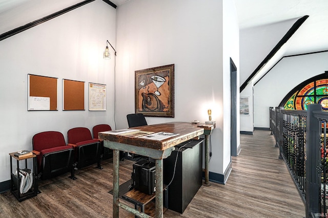 home office with dark wood-type flooring