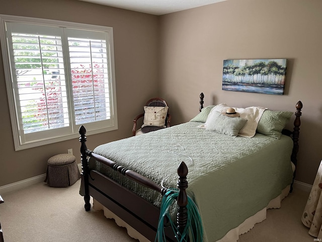 bedroom featuring carpet